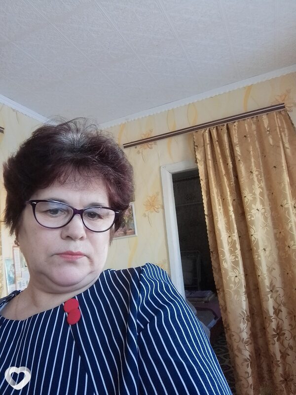 Мила
