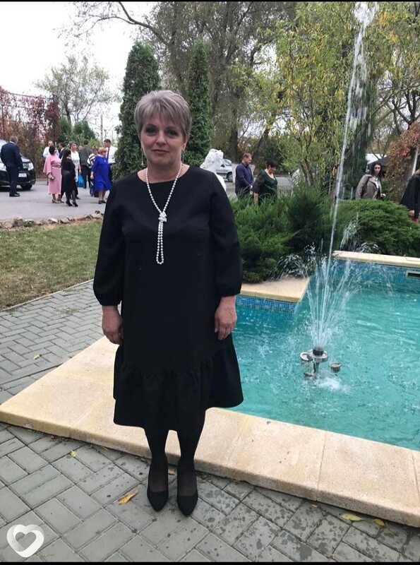 Мила