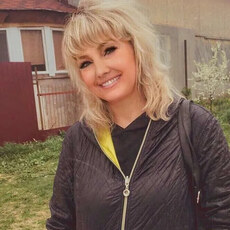 Мила