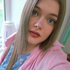 Оля