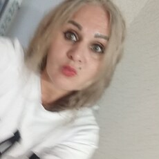 Мила