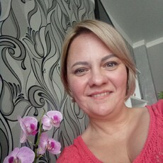 Мила