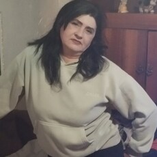 Мила
