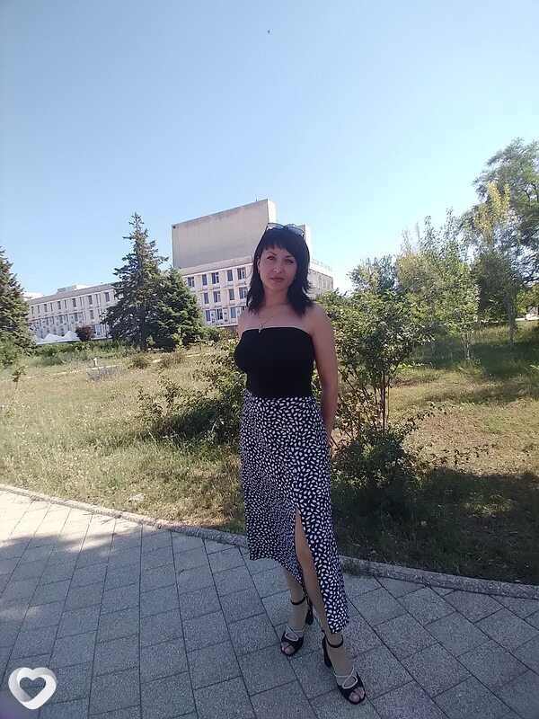 Мила