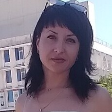 Мила