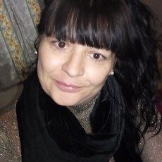 Мила